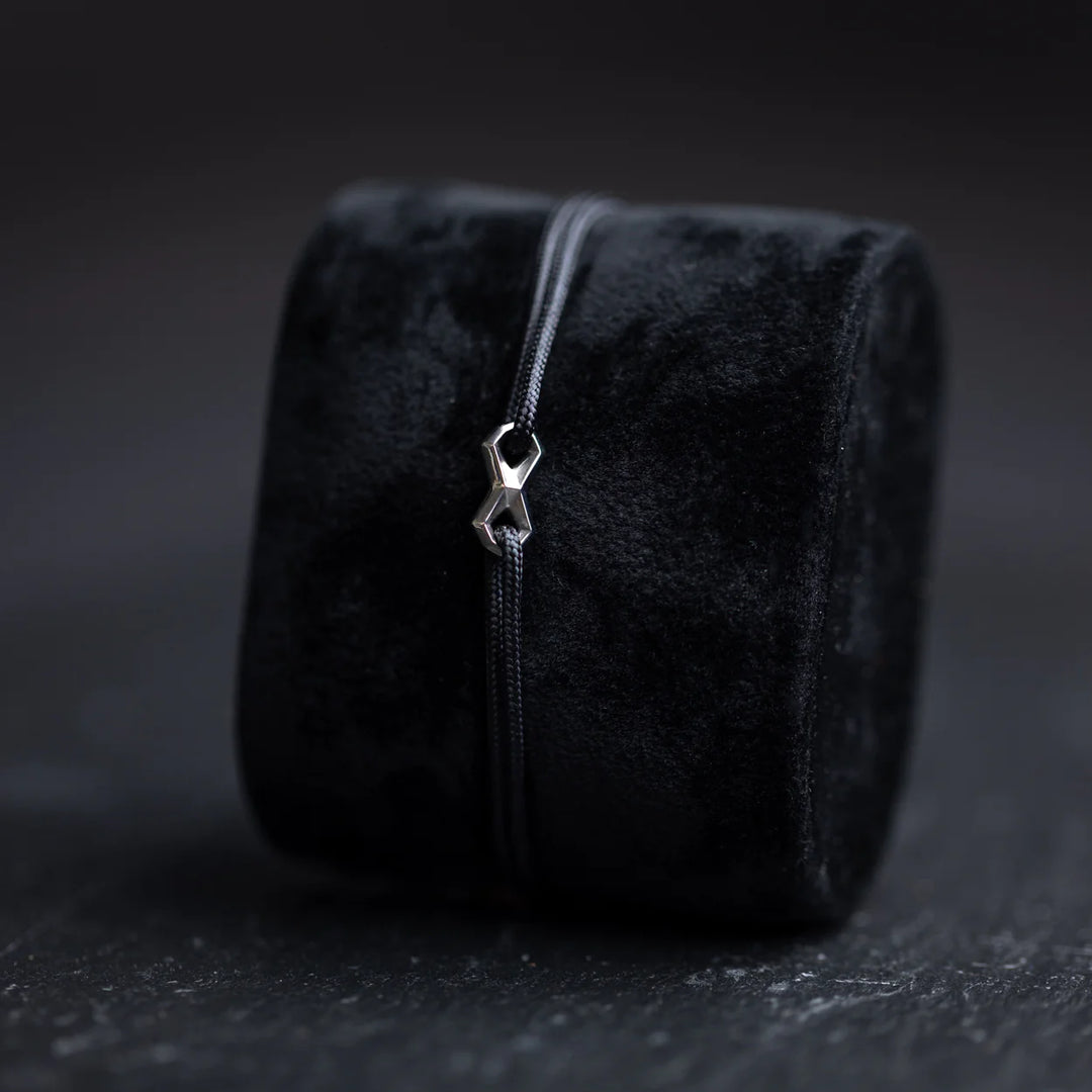 Nylonarmband 1,5 mm, schwarz, Infinity-Zeichen sillber