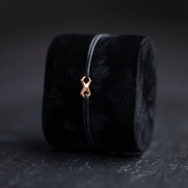 Nylonarmband 1,5 mm, schwarz, Infinity-Zeichen bronze